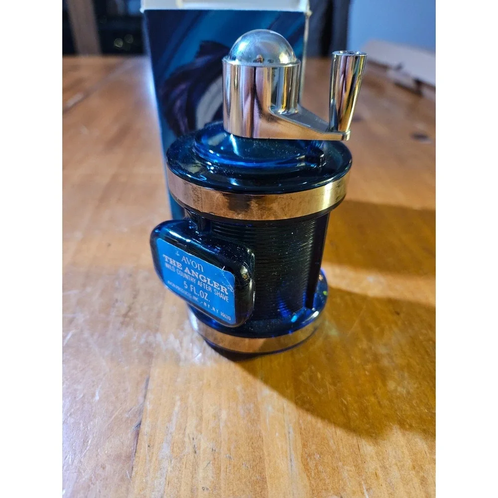 Vintage Avon The Angler Cologne Blue Fishing Reel Bottle FULL bottle. 1618
